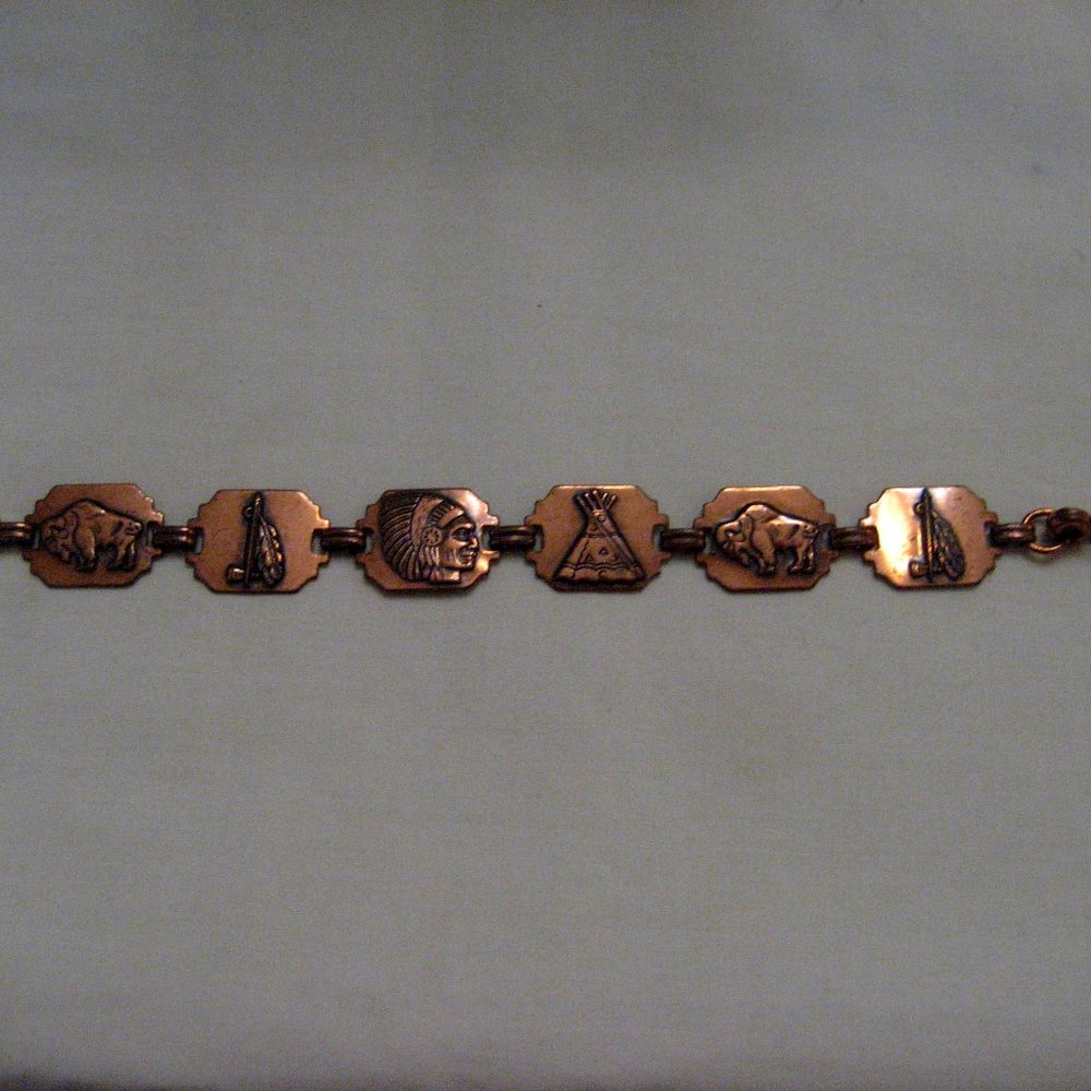 COPPER NATIVE AMERICAN STYLE CHARM BRACELET.